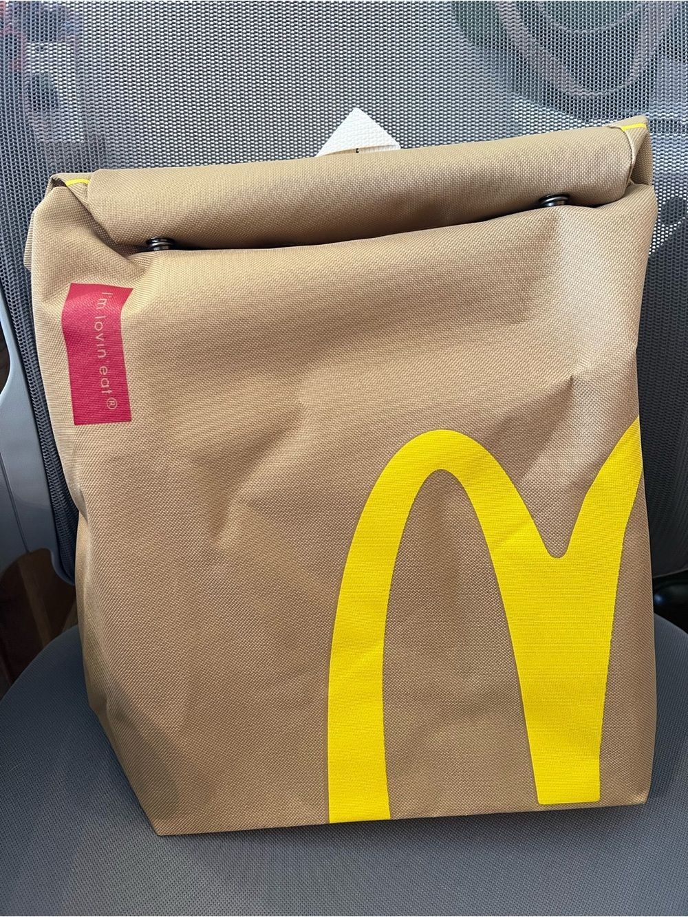 McDonald's Brown and Yellow  Roll-Top backpack .